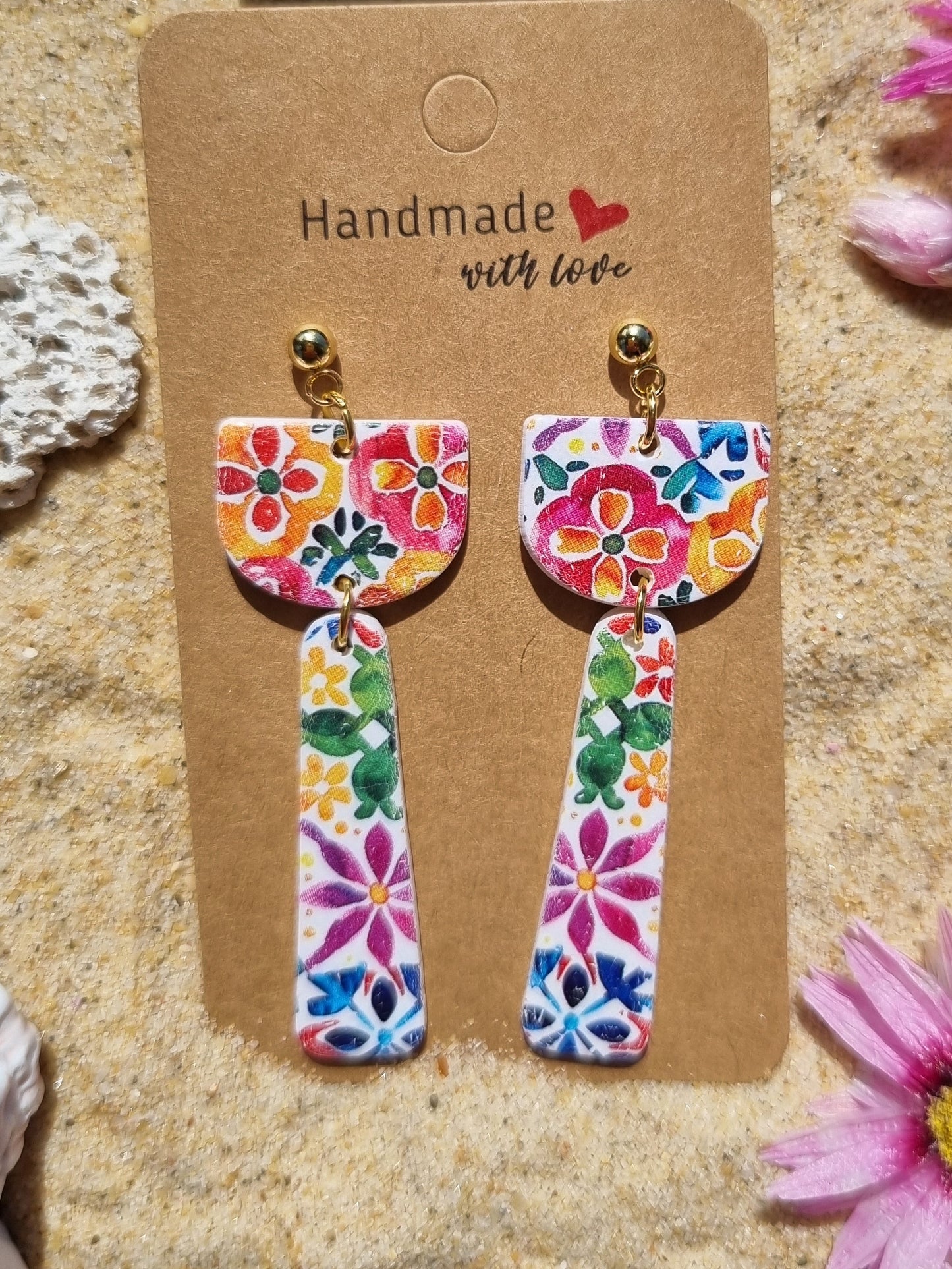 Colourful floral print on polymer clay reminiscent of a Mediterranean tile pattern Handmade in NSW Australia by Georgie Who