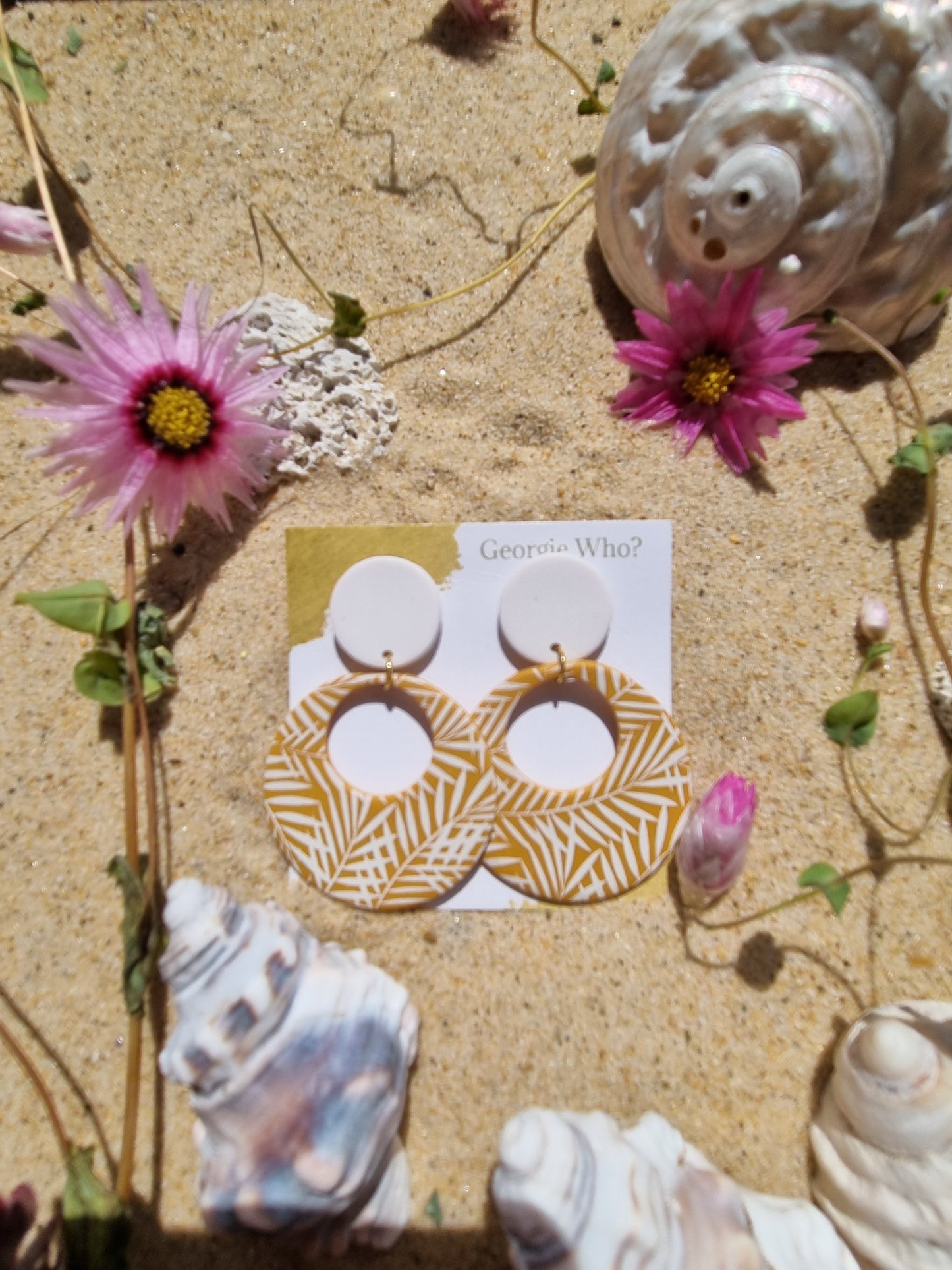 Mustard polymer clay earrings with white palm fronds. Handcrafted in Australia