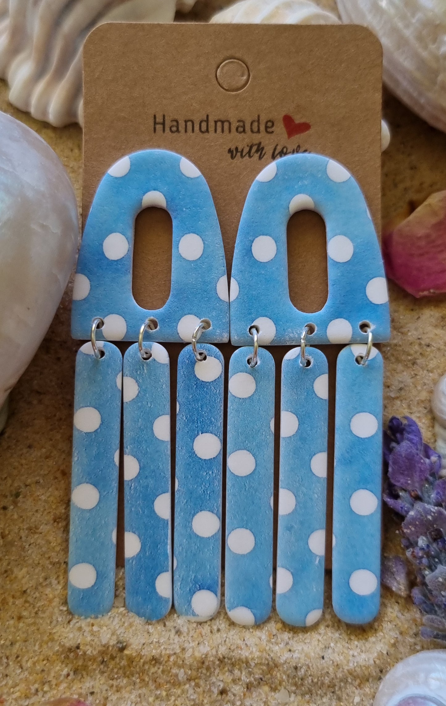 Sky blue with white polka dot polymer clay earrings. Made by Georgie Who in Australia