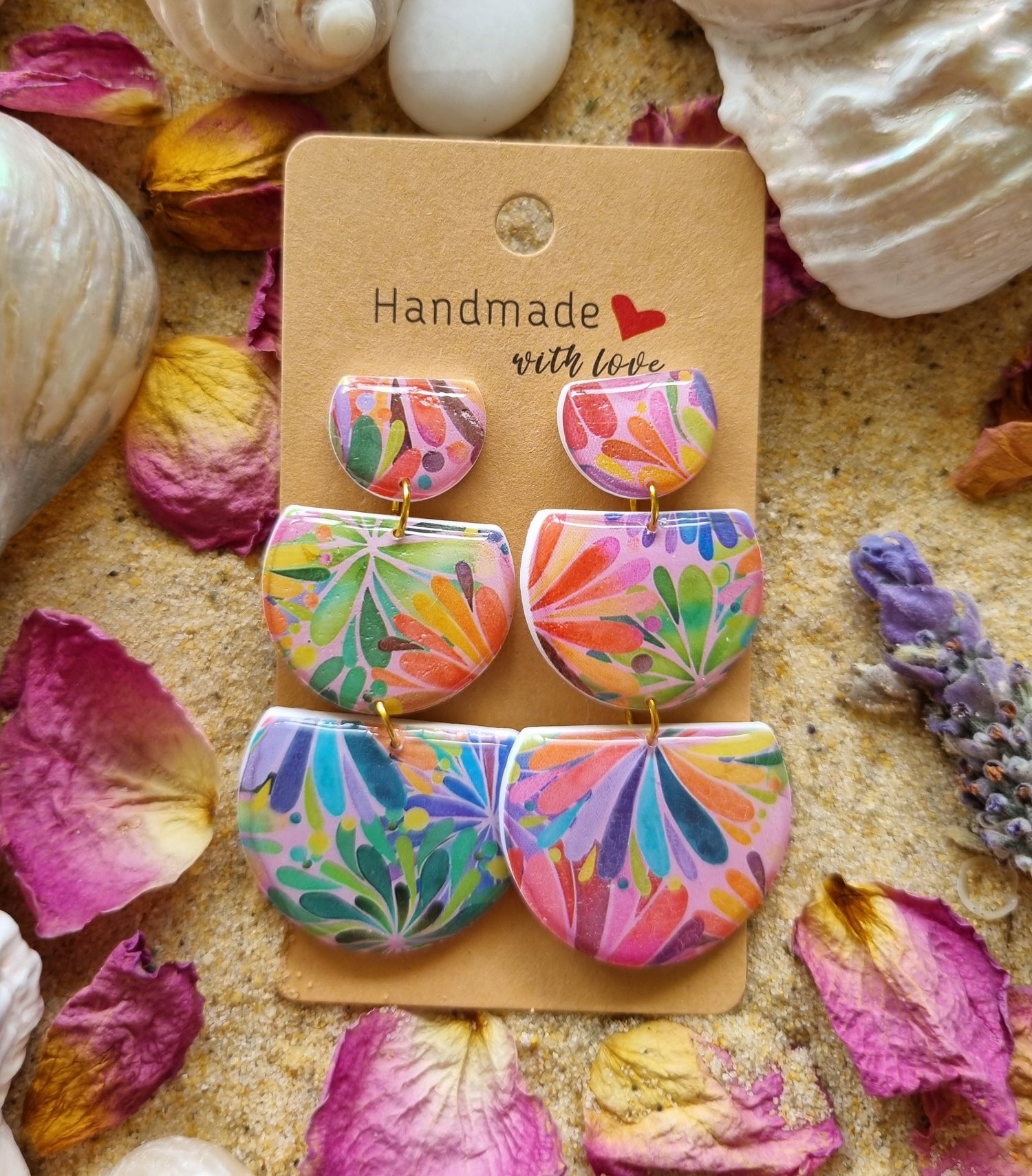 Polymer clay earrings with colourful vibrant fireworks design