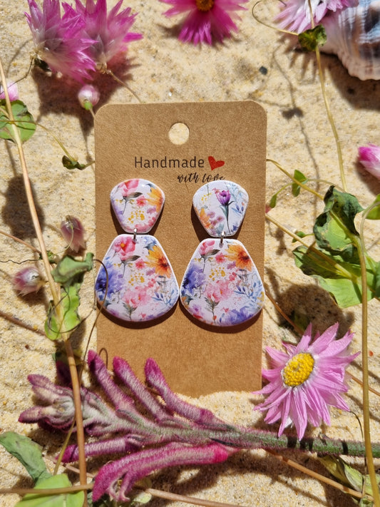 Delicate floral polymer earrings in shades of lavender 