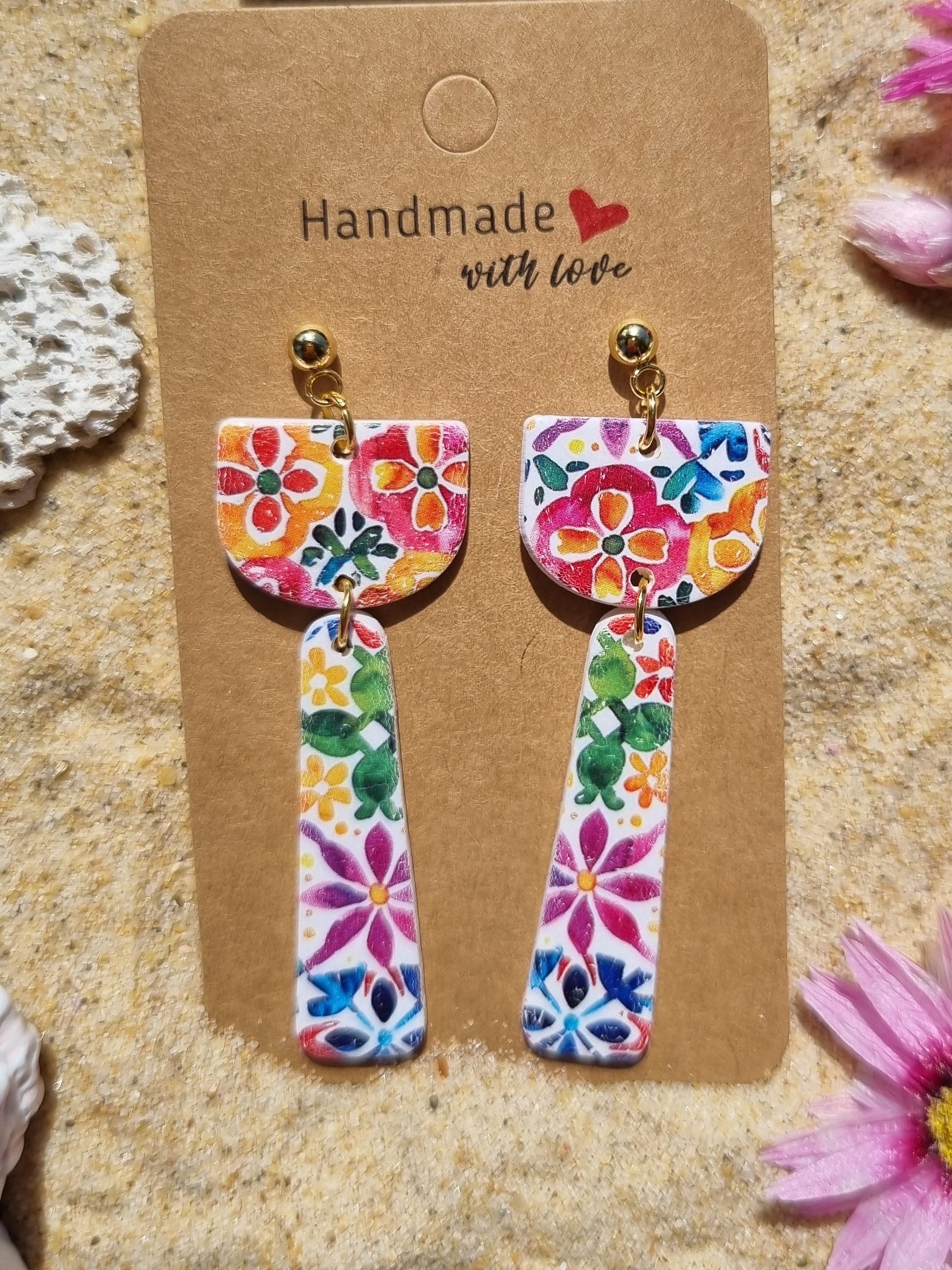 Colourful floral print on polymer clay reminiscent of a Mediterranean tile pattern Handmade in NSW Australia by Georgie Who 