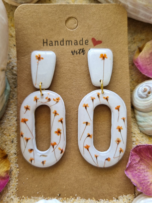 Wildflowers on polymer clay topped with resin earrings made in australia 
