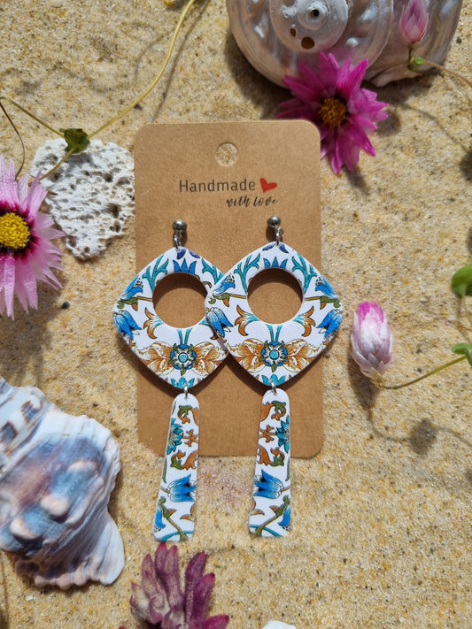 Mediterranean Bloom polymer clay dangle earrings in deep blue, white, and terracotta with floral-inspired Mediterranean tile design
