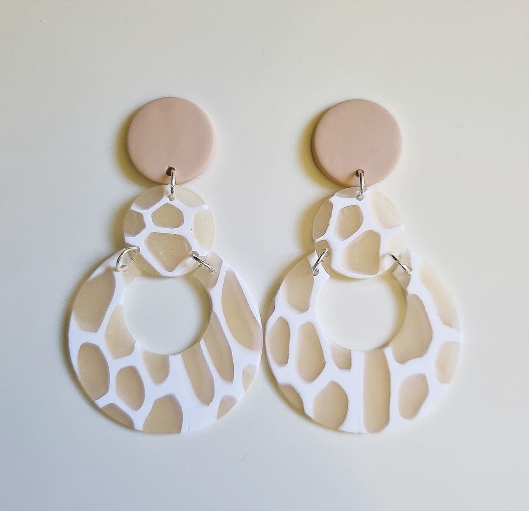 Translucent Polymer Clay Earrings that capture the look of the sea swirling around pebbles and shells